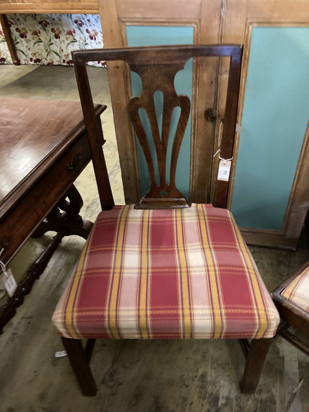 A set of ten George III country Chippendale mahogany dining chairs, W.1ft 7.5in. H.3ft 1.5in.